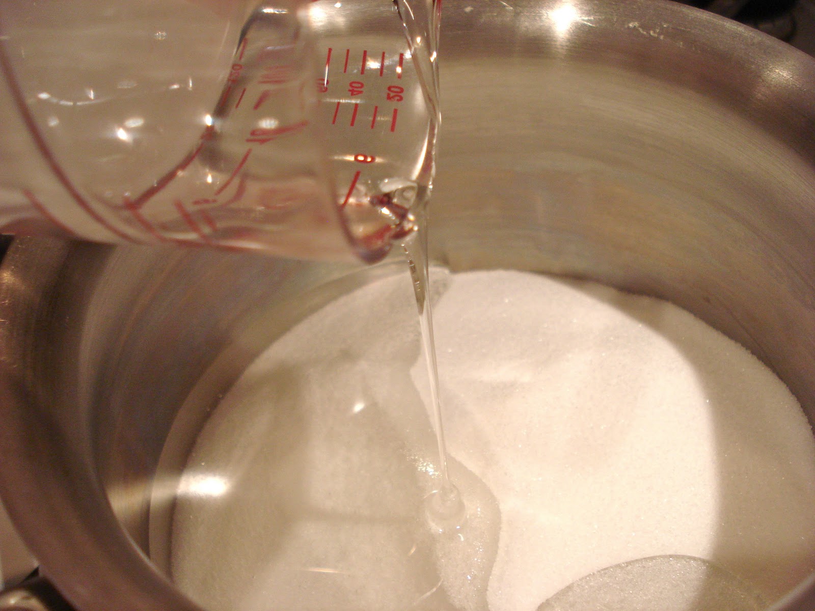 bowl, whisk together the sugar and vegetable oil until well combined.