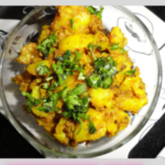 " Jeera Aloo Recipe!!" and "queenofrecipes.online" written on an image with Jeera Aloo