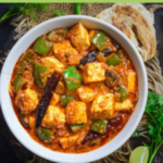 " Kadai Paneer Recipe!!" and "queenofrecipes.online" written on an image with Kadai Paneer.