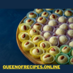 " Nariyal Ke Laddu Recipe!!" and "queenofrecipes.online" written on an image with Nariyal Ke Laddu
