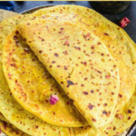 " Puran Poli Recipe!!" and "queenofrecipes.online" are written on an image with a Puran Poli.
